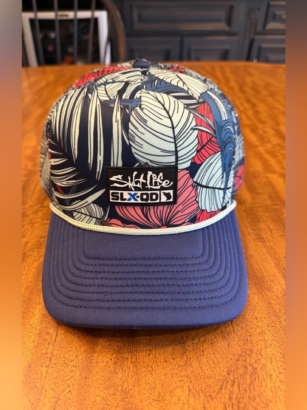 SALT LIFE men’s SLX-QD Live Salty Tropical Leaf Trucker Hat